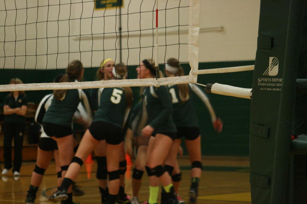 Photo+by+Prospector+staff%0A%0AWith+a+2-0+lead+in+the+final+match+at+Regionals%2C+the+Mustangs+bring+it+together+before+their+third+game.