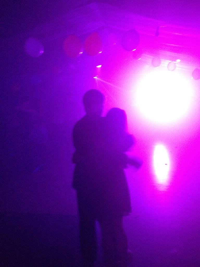 Couples dance in the serious moonlight. Snowcoming week ended with A Night in the Stars or a space themed dance, complete with fog machines and blacklights. 