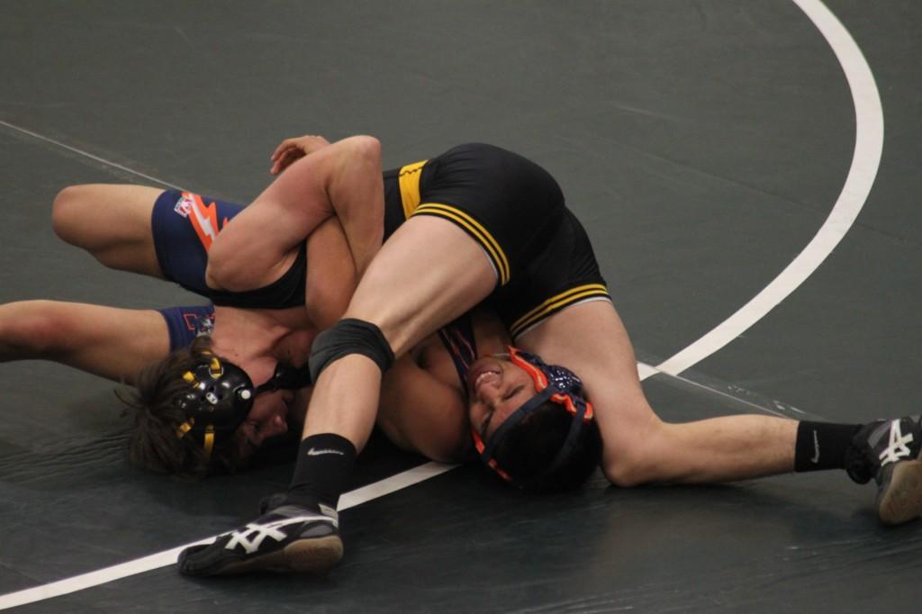 Michele Payce (11) crawls out of a pirate submission attempt.