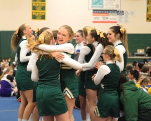 The team celebrates after being announced the Tri-Peaks League 3A League Champions. In the front, newcomers Zoe Schnurman (10) and Brooke Sedlacek (9) hug in excitement. 