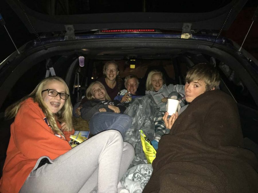 Lizzy Butts (9), Peter March (9), Parker Hall (9), Aubrey Hall (11), Lily Reavis (12) and Mo Heiniger (12) enjoy the movie in the back of Reavis car.
