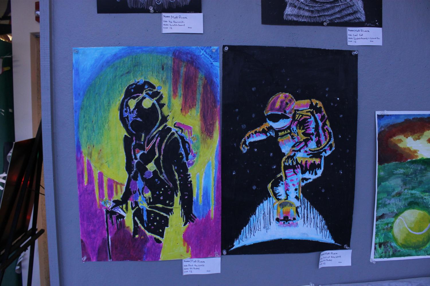 Matt Riveras pieces, Paint the World and Out of this World, were both done with oil pastel.