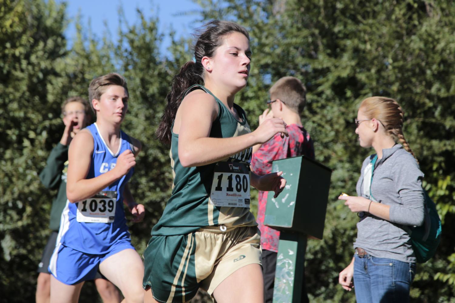 Braeden Lewis (12) placed 5th at the Florence Invite, where the girls cross country team came in first place. 