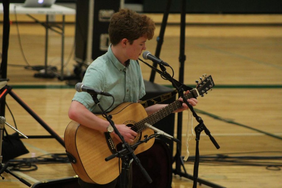 Owen White (10) sang Vincent, by Don McLean, while playing his guitar.