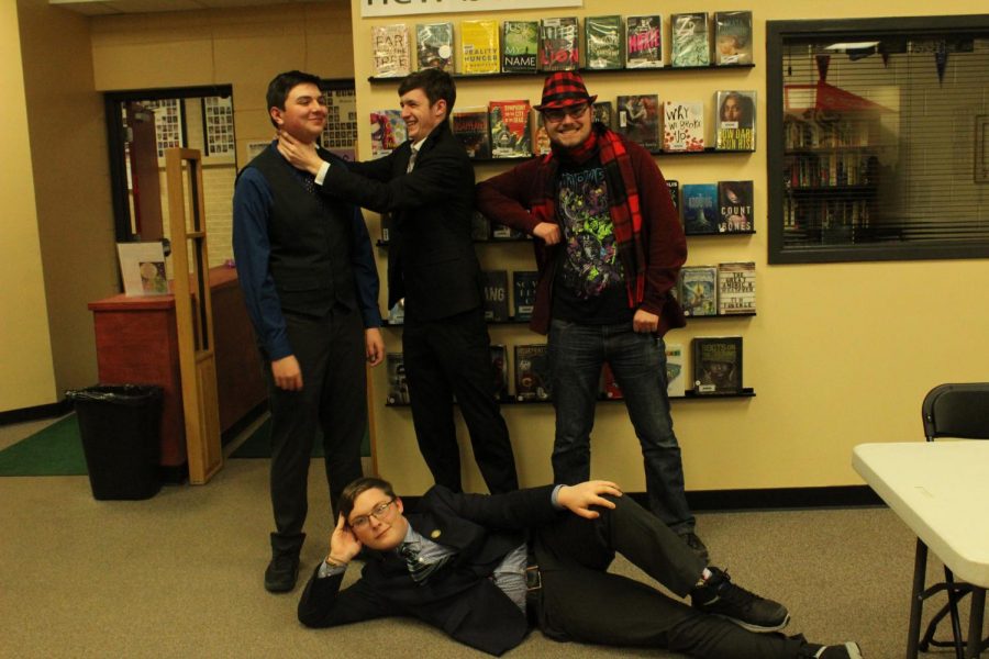 The Manitou Springs Forensic Members Taylor Knight (11), Tyler McCune (10), Jacob Underwood (12) and Gideon Aigner (9) pose for a creative team photo.