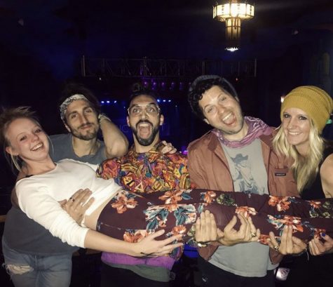 Paige Harrison (10) meeting Magic Giant band members (from left to right) Austin Bisnow, Zango Tango, Zambriki and Audrey Hegert