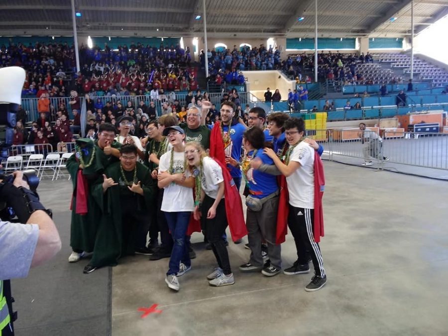 Just moments after winning the final playoff match, the drive teams of the alliance group together to celebrate their exciting win