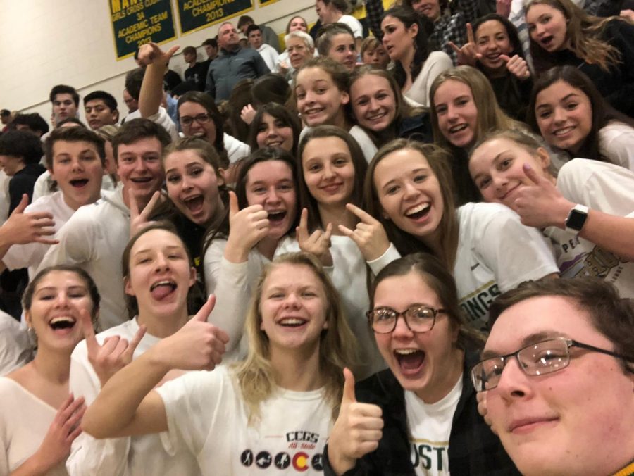 Gideon Aigner (far right) in a selfie with the crowd at the St. Marys boys basketball game in January.
