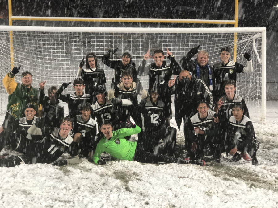 CELEBRATION ENSUES.  After the fans rushed the snowy field, Varsity celebrated in the snow.