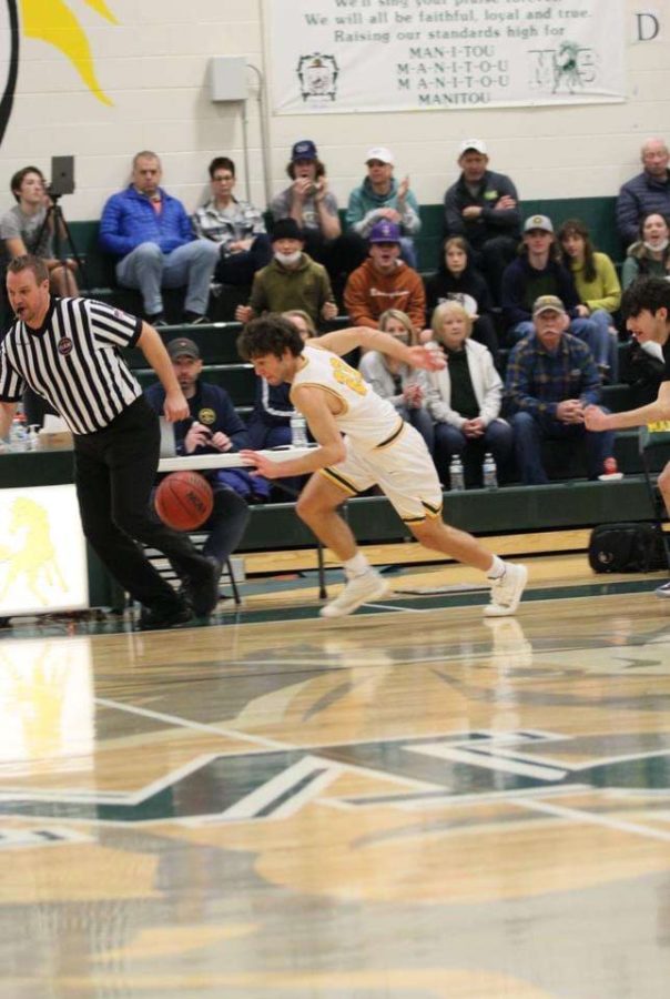 Junior Lairden Rogge leads the fast break at home against Salida on January 15, 2022. Rogge has a total of 148 points this year. 