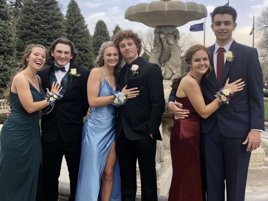 Abigail Parker, Cian Melker, Weatherly Hall, Raymond McCaskey, Ayla Lehner, and Aaron Clune, get their prom pictures taken with their dates at the Broadmoor.