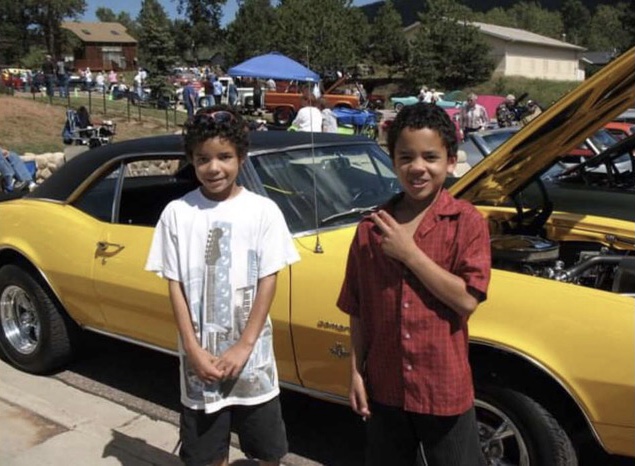 Jalen and Terry Lindh hang out at a car show when they were 6 years old.
