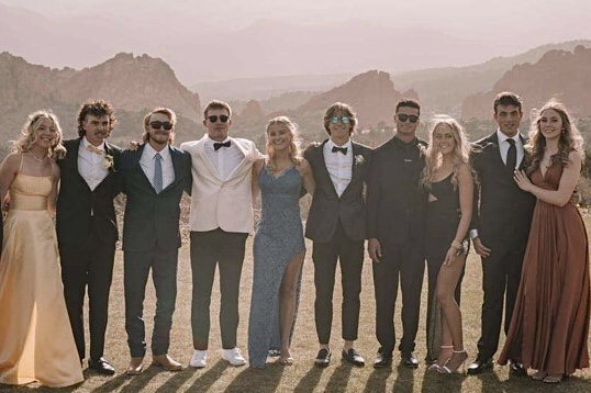 Ella Carroll, Eligh Hettle, Kody Smith, Ethan Boren, Ashlyn Thomson, Davis Mack, Tate Christian, Serena Holvenstot, Nicholas Marro and Katy Vance, take pictures with their dates at Garden of The Gods before the 2022 prom dance.