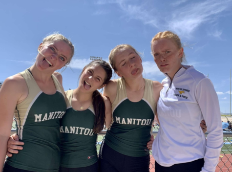Adele Goodwin (12), Kailey Vigil (9), Kayla  Apotheker (12) and Anna Kilpela (12) celebrate a personal record in sprint medley relay (SMR) 800m relay on Friday.
