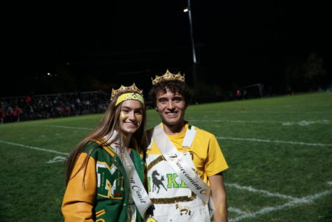 Homecoming king and queen, Lairden Rogge (12) and Grace Allen (12), wearing their crowns and sashes.