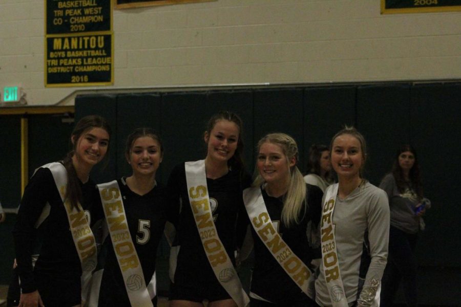 All five senior girls volleyball players before their game against the University Bulldogs on senior night.