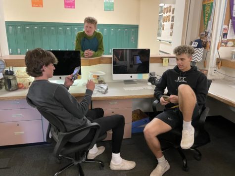 Andrew Rhodes (12), Jack Embery (12) and Tyler Maloney (12) take a break from their classes to help regain some determination.
*photo illustration