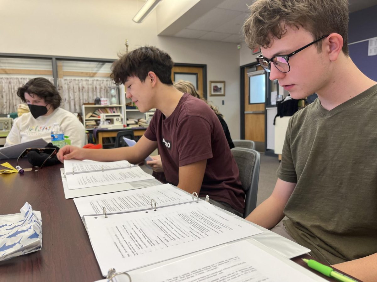 Beket Wendell-Evans, Isaac Boczkiewicz and Meghan Taylor run the script for the spring play for practice at MSHS on Mar. 6. The first rehearsal was on Mar. 5.