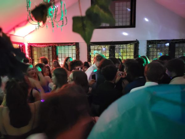 Students shuffled onto to the upper dance floor, as the music blared and students boogie. 