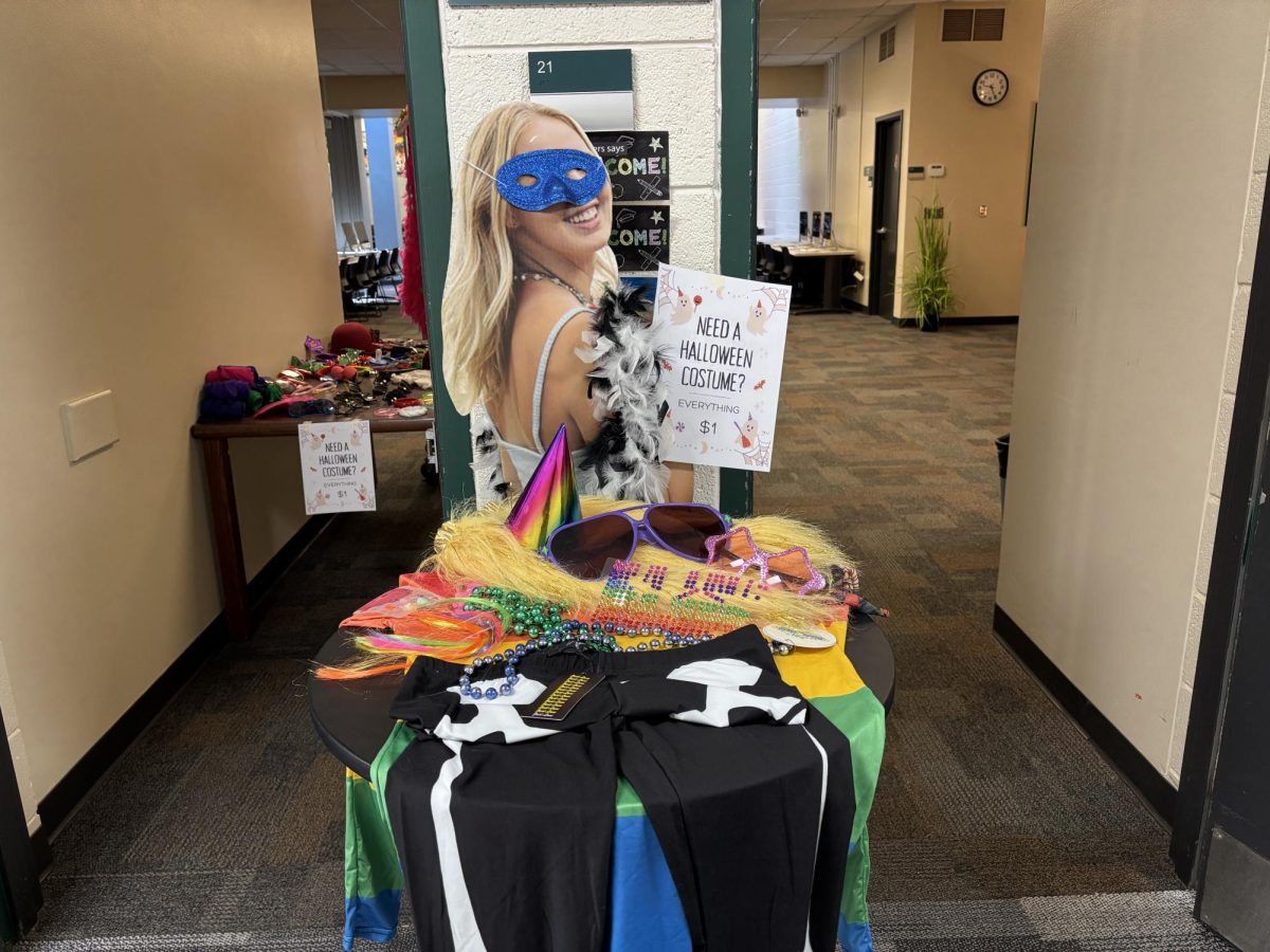 Environmental Club set up a Halloween table for students to see on Oct. 29 to encourage students to shop the Flip and Drip. It is out in the hallway to influence students further.