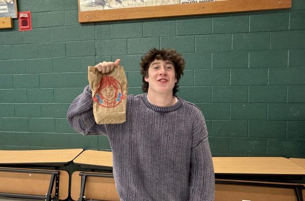 Ashur Lavigne (12) goes to Wendy's before his basketball game against Rye.