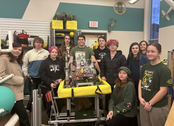 The robotics team presents the robot, Nicolas Cage, that they built last year.