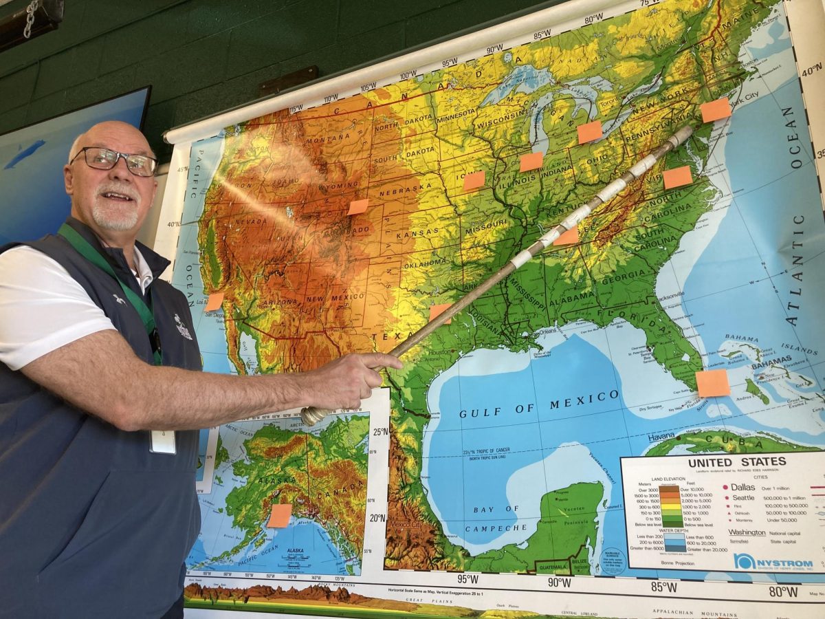 Brian Brown points to Pennsylvania on a map.