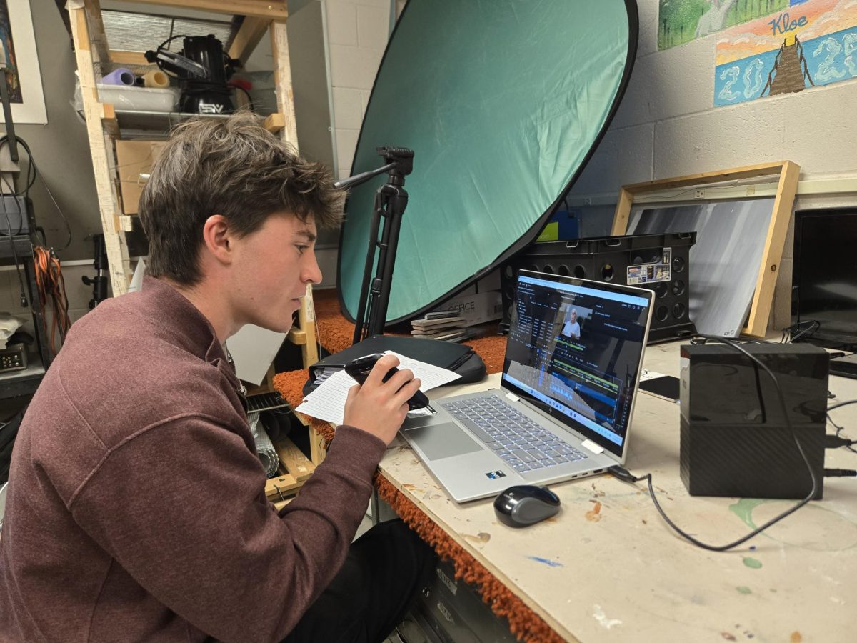 Kyle Blasi (12) edits his documentary for the Youth Documentary Academy while doing independent study.