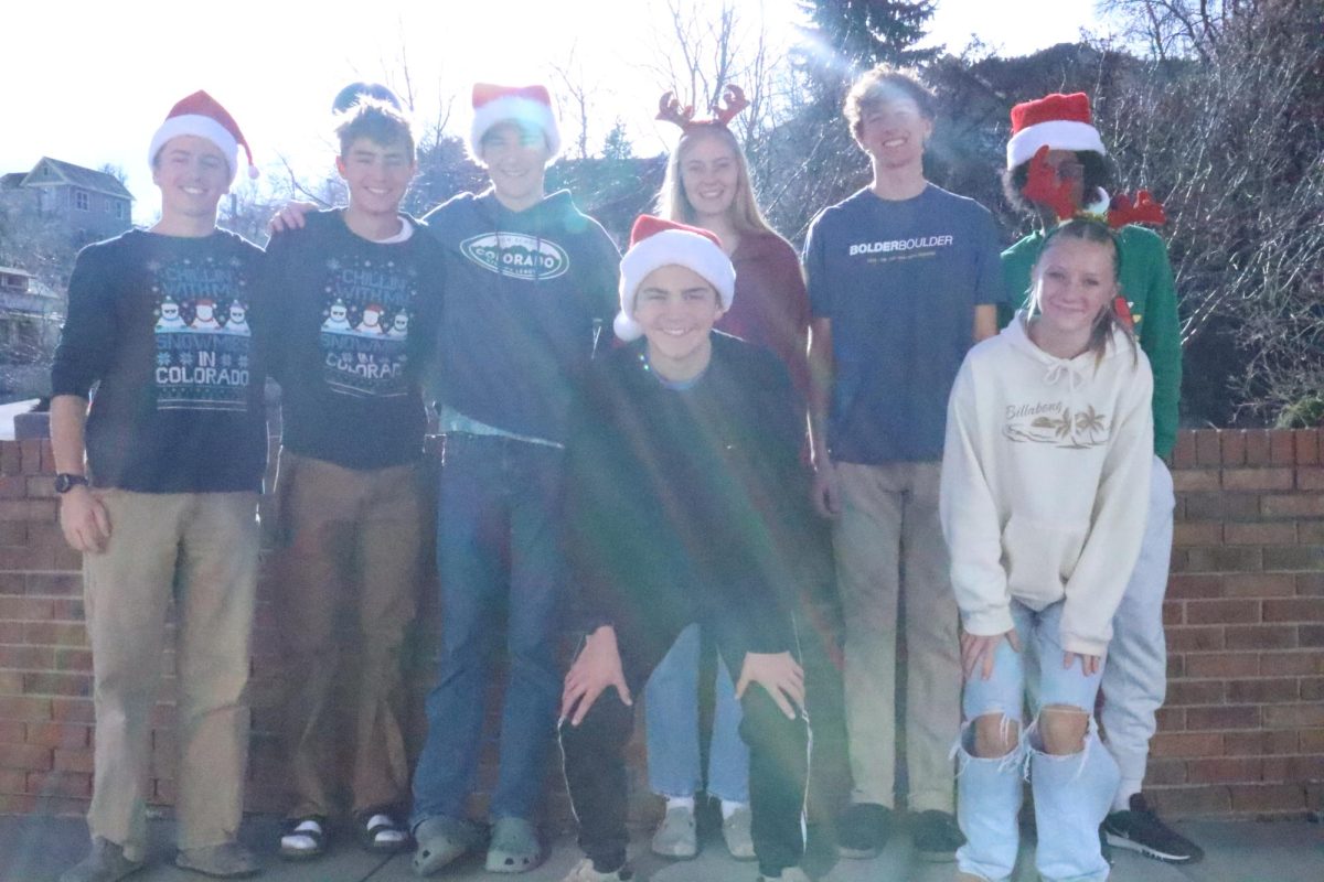 Key Club members pose after a successful and fun breakfast with Santa out side City Hall on Dec. 13.