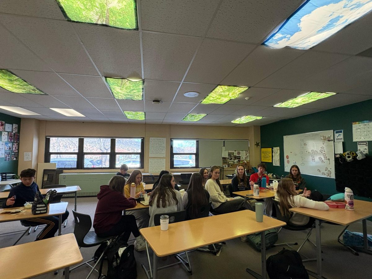 FCA members discuss the daily verse during their meeting on Tuesday, Jan. 28.