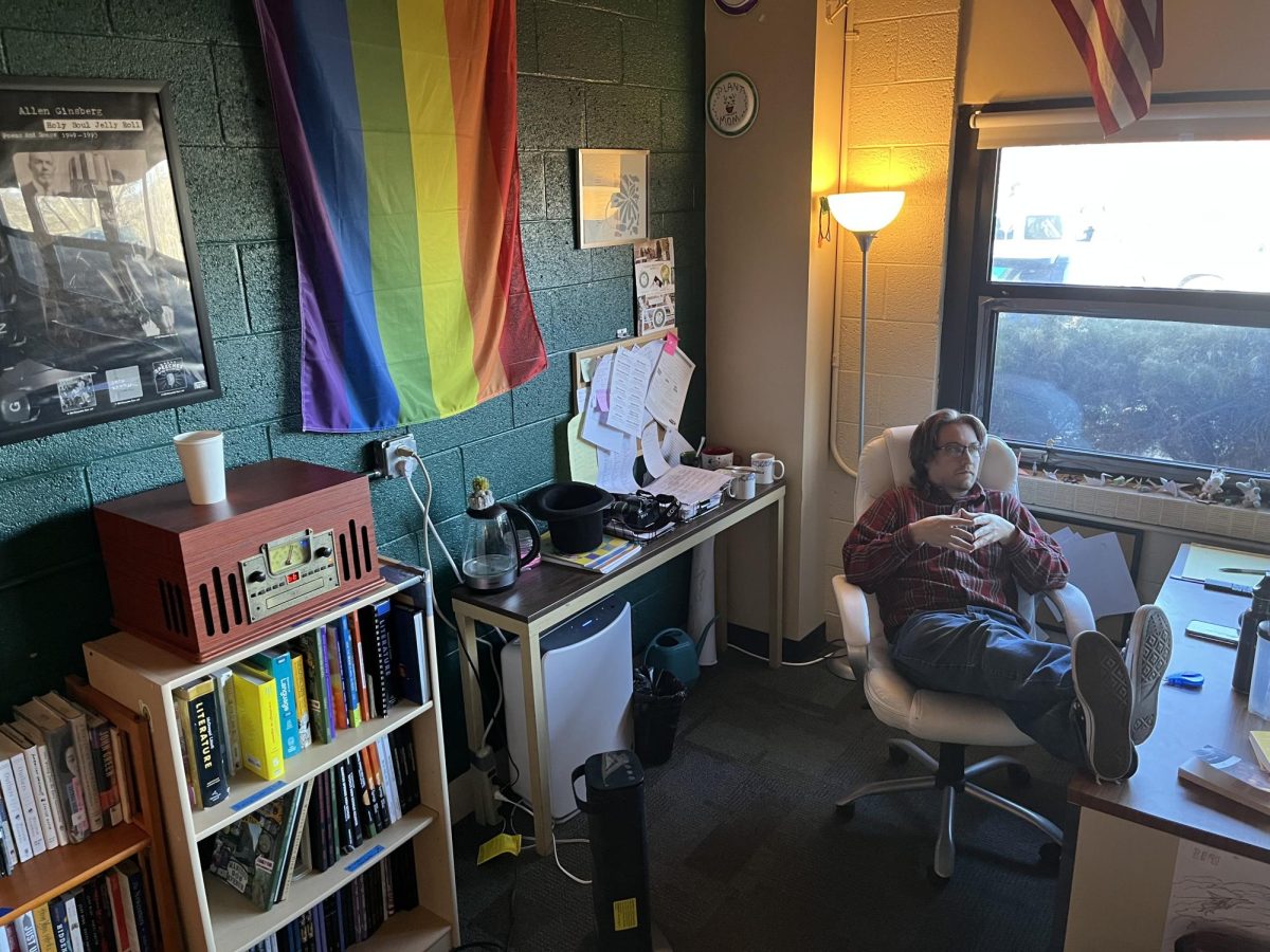 Riley Walker sits at his desk during his planning period contemplating life and his future lessons.