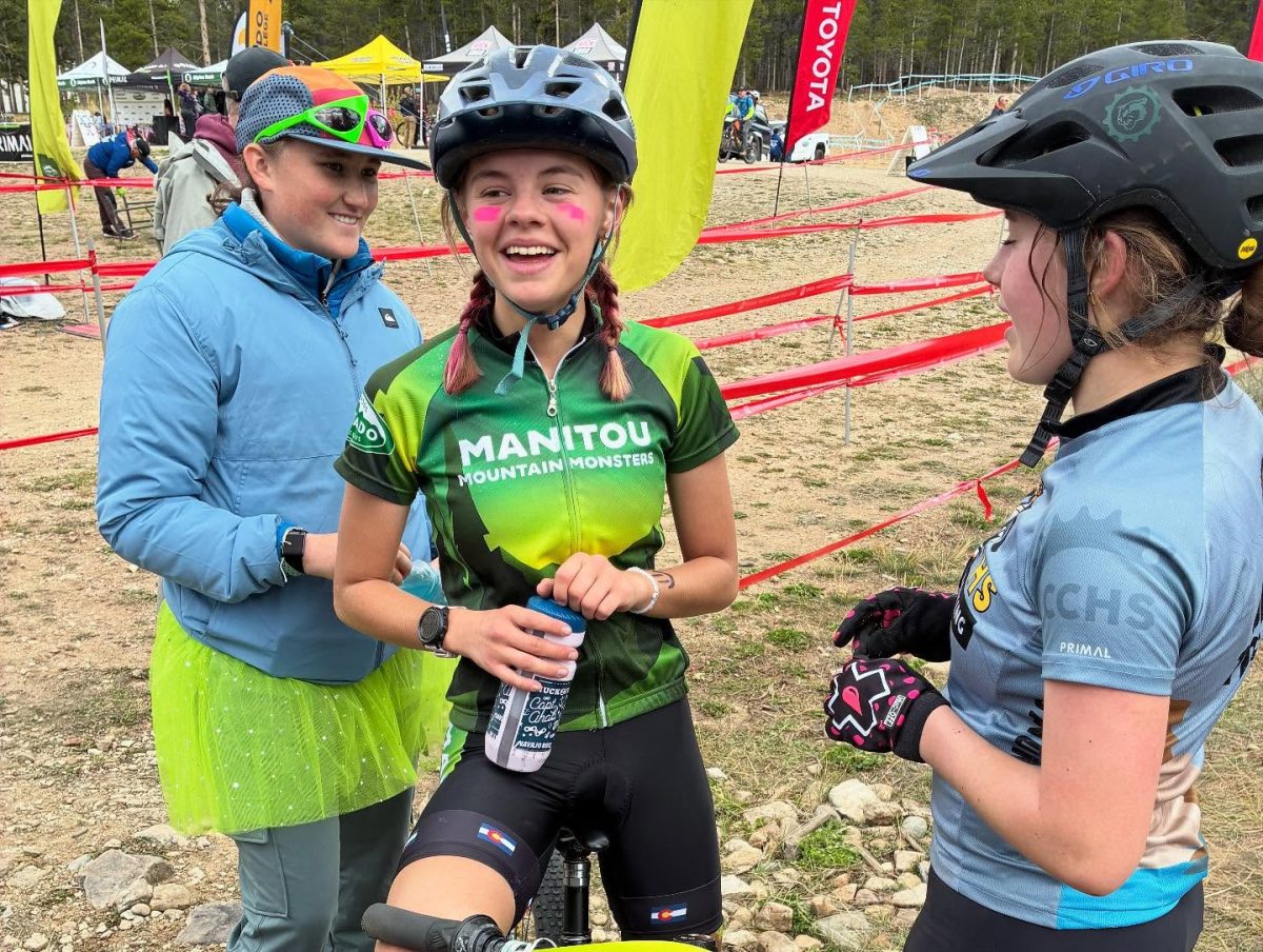 Naomi Porter (12) celebrates with other girls varsity riders after her 7th place finish at race #3 in Leadville, Colorado. Porter's strong finish contributed to her winning of the Most Improved Female award at State.