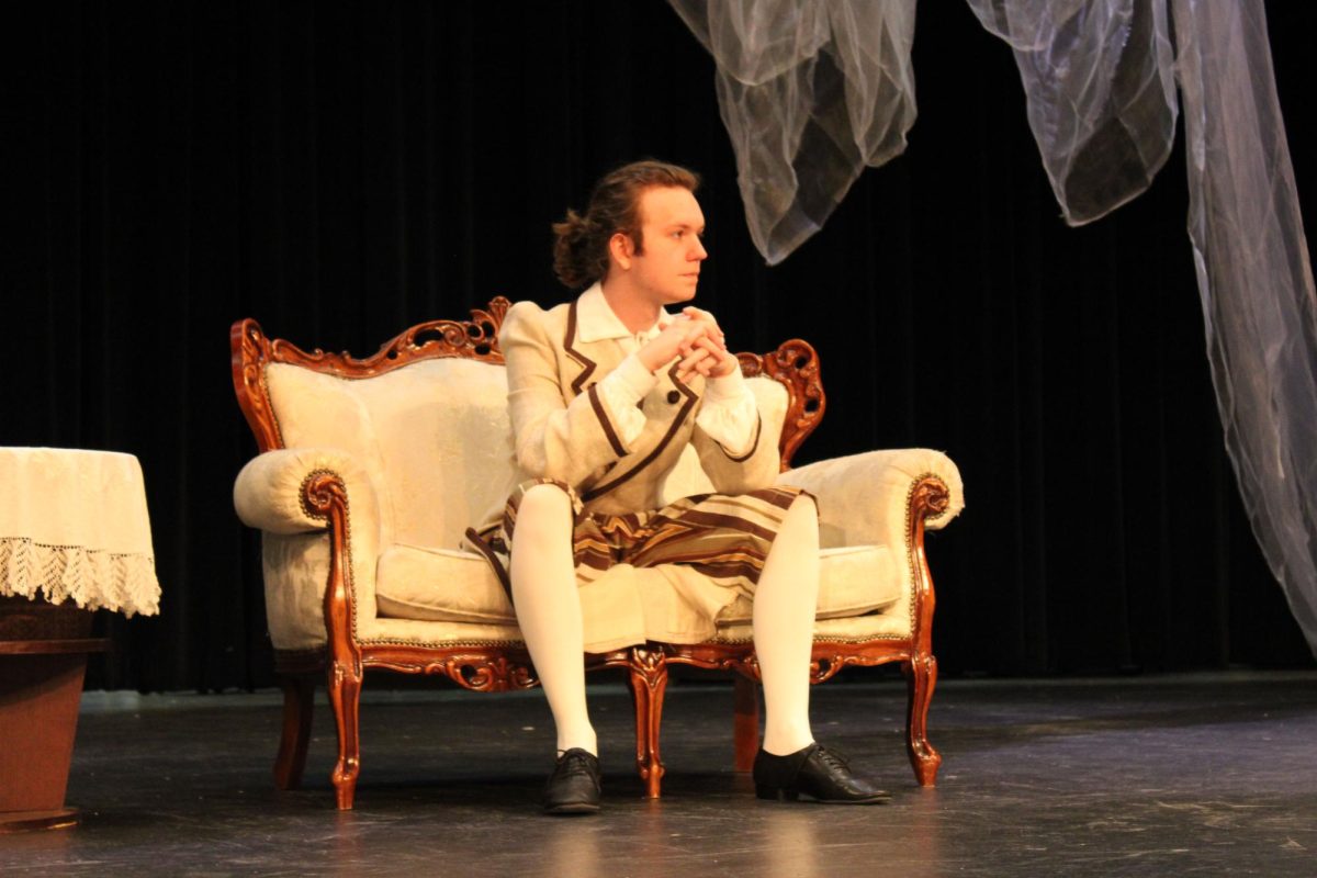 Becket Wendell-Evans (12) performs as his character Orgon on the closing night of "Tartuffe" on April 18.